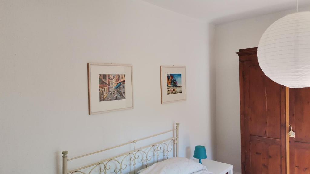 Postel nebo postele na pokoji v ubytování Il carrubo B&b