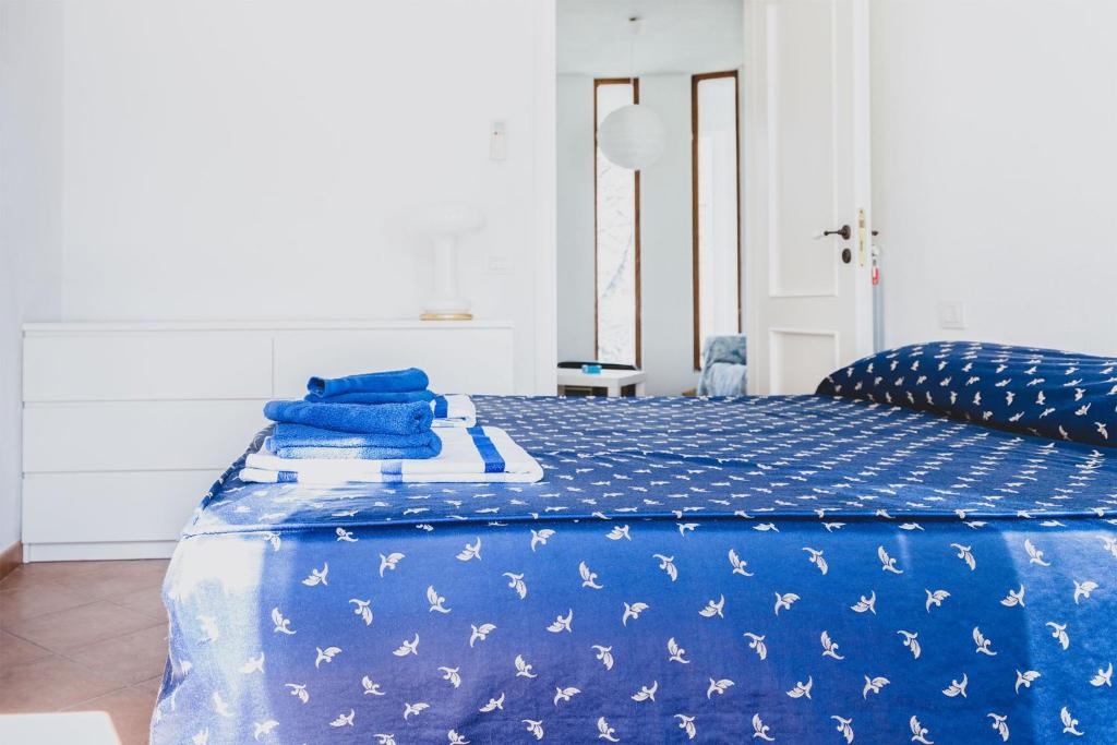 Postel nebo postele na pokoji v ubytování Il carrubo B&b