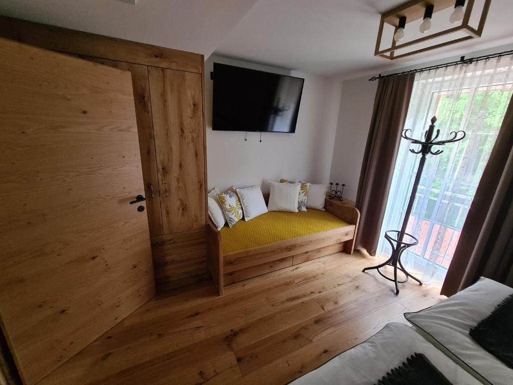 Posteľ alebo postele v izbe v ubytovaní Ferienhaus Winzerhaus Südsteiermark