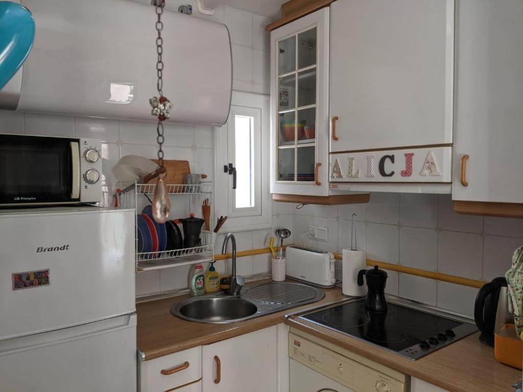 Kuchyň nebo kuchyňský kout v ubytování Apartament Elizabet