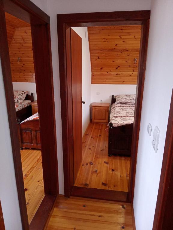 Postel nebo postele na pokoji v ubytování Apartmani Bane