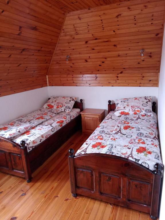 Postel nebo postele na pokoji v ubytování Apartmani Bane