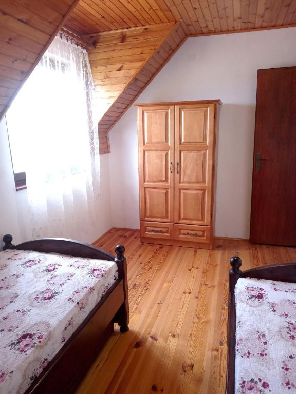 Postel nebo postele na pokoji v ubytování Apartmani Bane