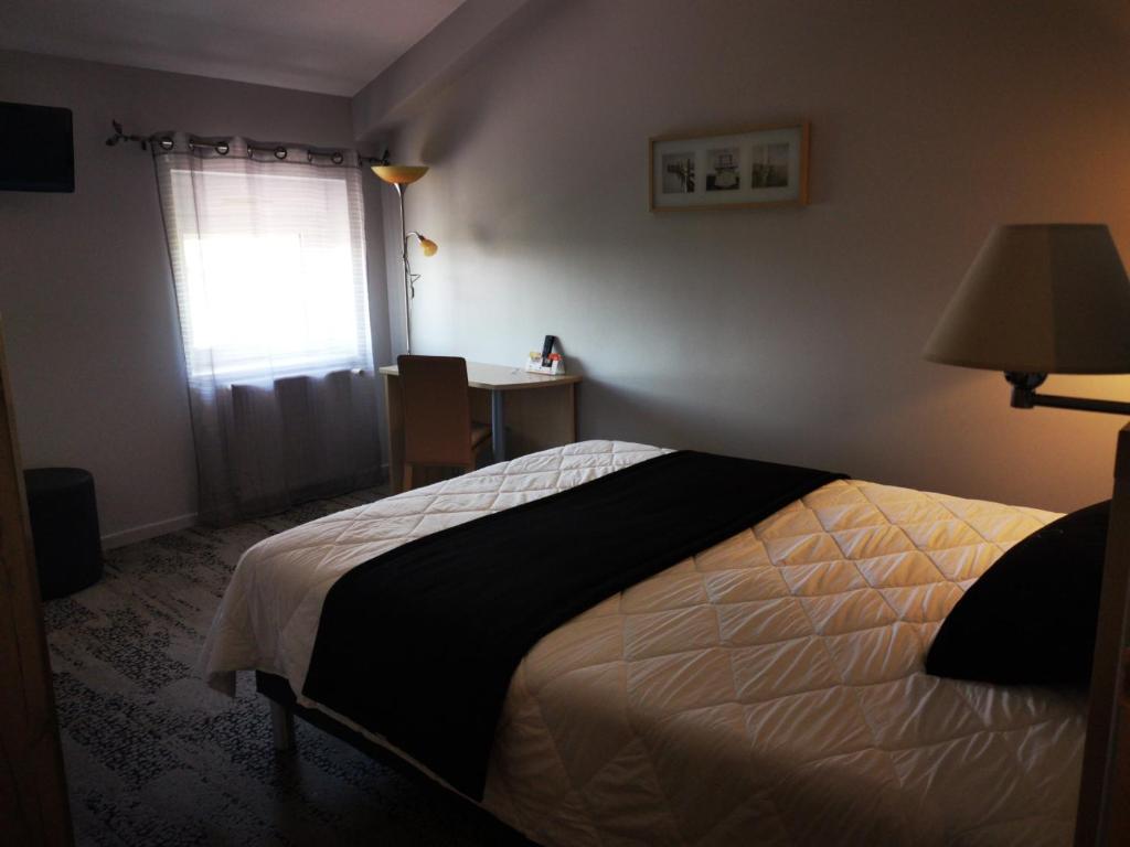 Postel nebo postele na pokoji v ubytování Château Blanchard