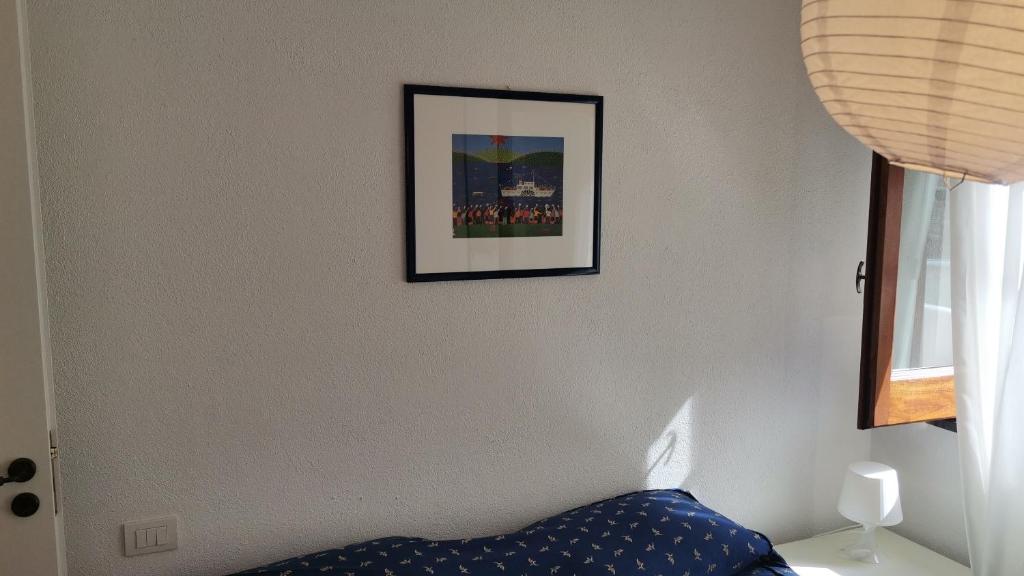Postel nebo postele na pokoji v ubytování Il carrubo B&b