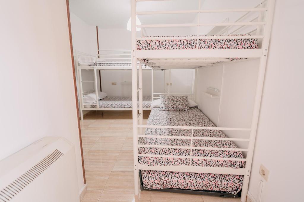 Posteľ alebo postele v izbe v ubytovaní Apartamento La Iglesia