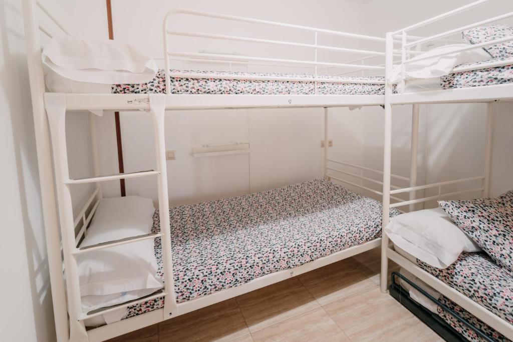 Posteľ alebo postele v izbe v ubytovaní Apartamento La Iglesia