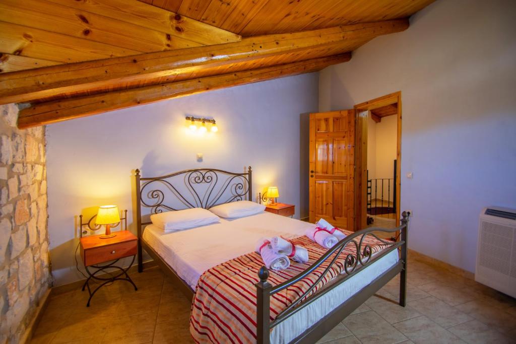 Postel nebo postele na pokoji v ubytování Ammos Zante Villas