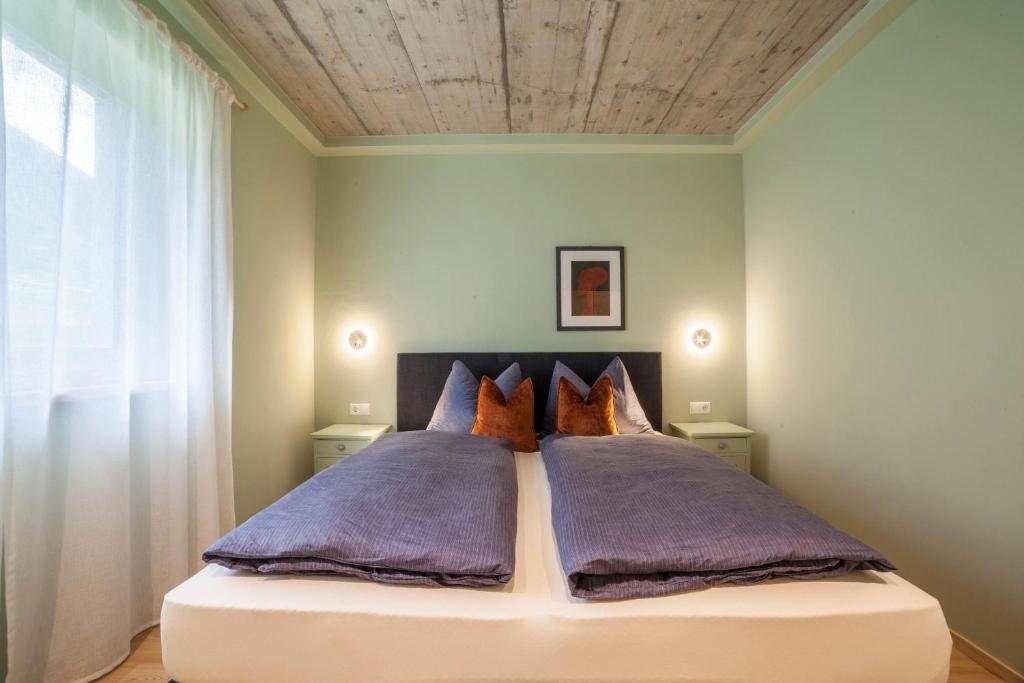 Postel nebo postele na pokoji v ubytování Apartment Das Runde