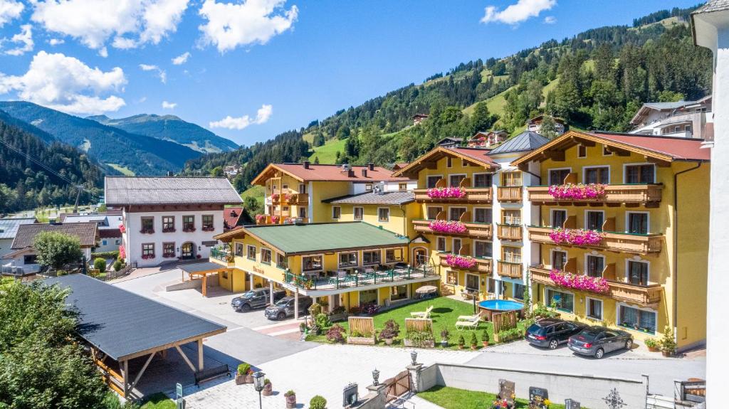 an aerial view of a hotel in the mountains at Hotel Oberwirt - Das herzliche Hotel in Viehhofen