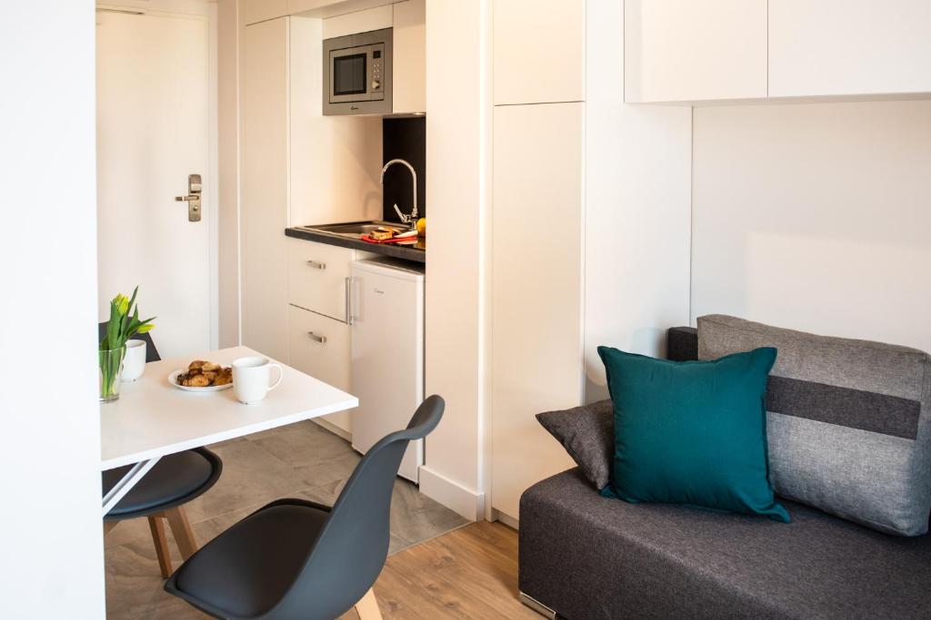 Kuchyňa alebo kuchynka v ubytovaní TPS Apartamenty Olimpijskie