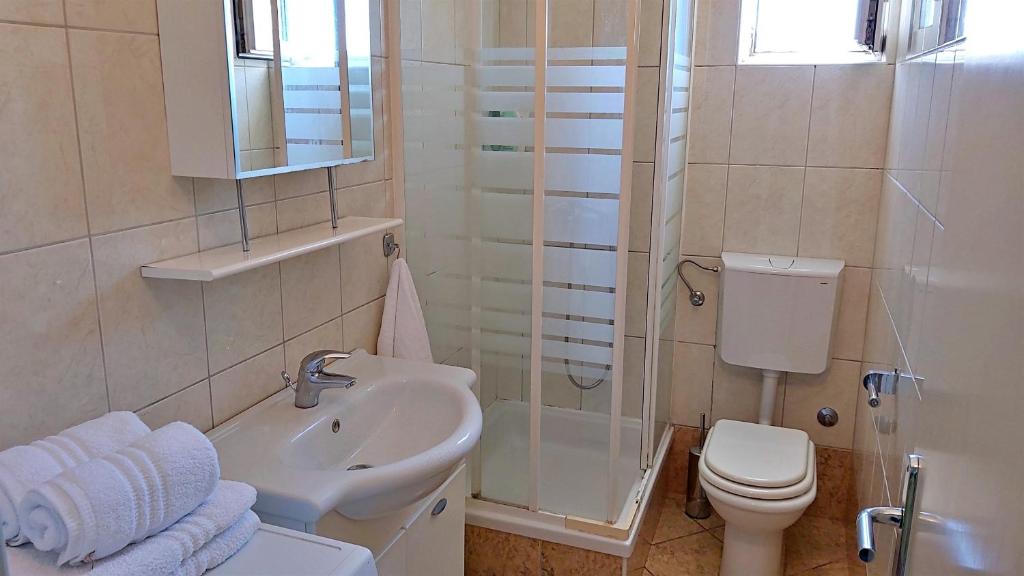 Koupelna v ubytování Apartments Nemira