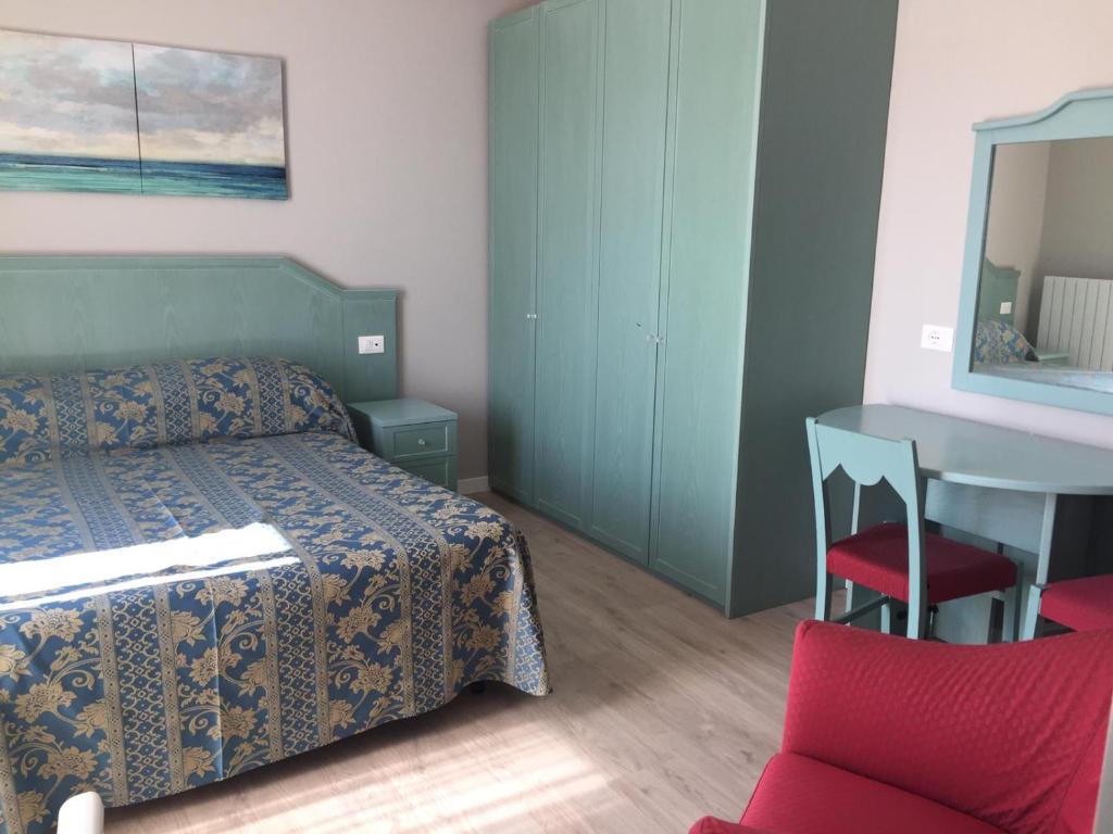 Postel nebo postele na pokoji v ubytování La Quiete Park Hotel
