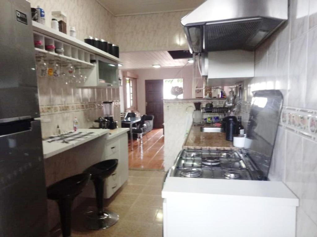  Casa próxima lagoa com Ar e piscina