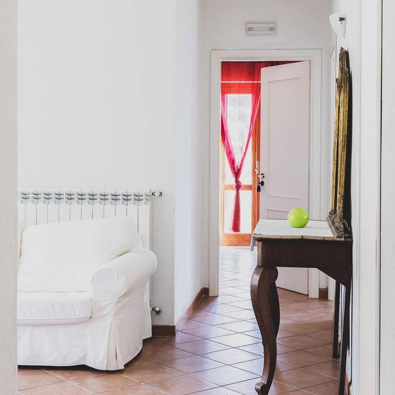 Postel nebo postele na pokoji v ubytování Il carrubo B&b