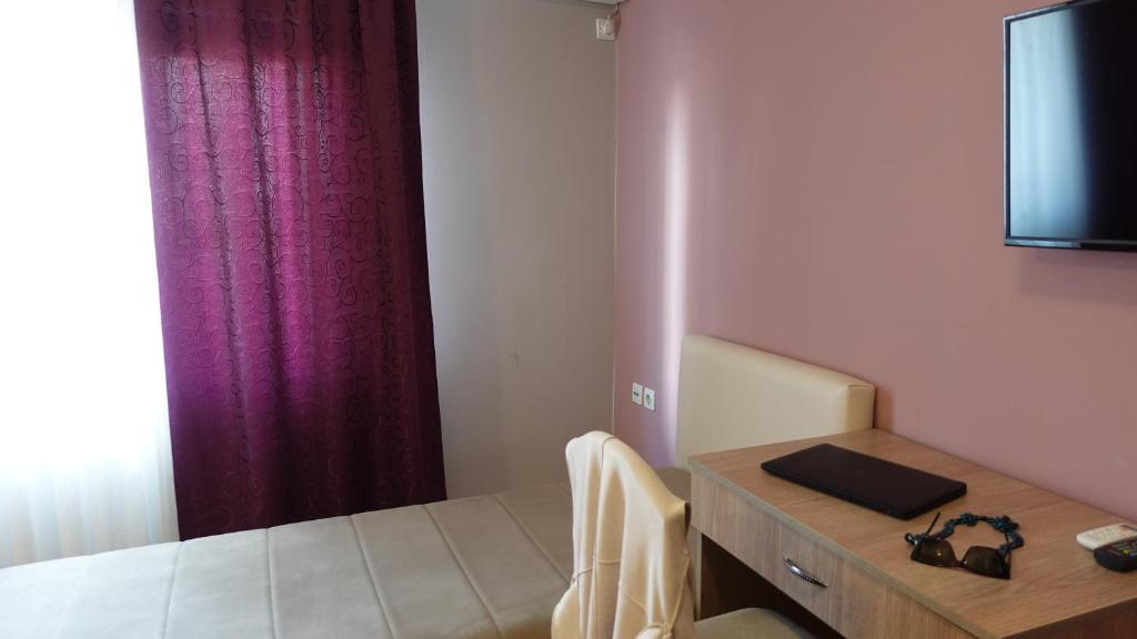 TV a/nebo společenská místnost v ubytování Apartments Tatjana