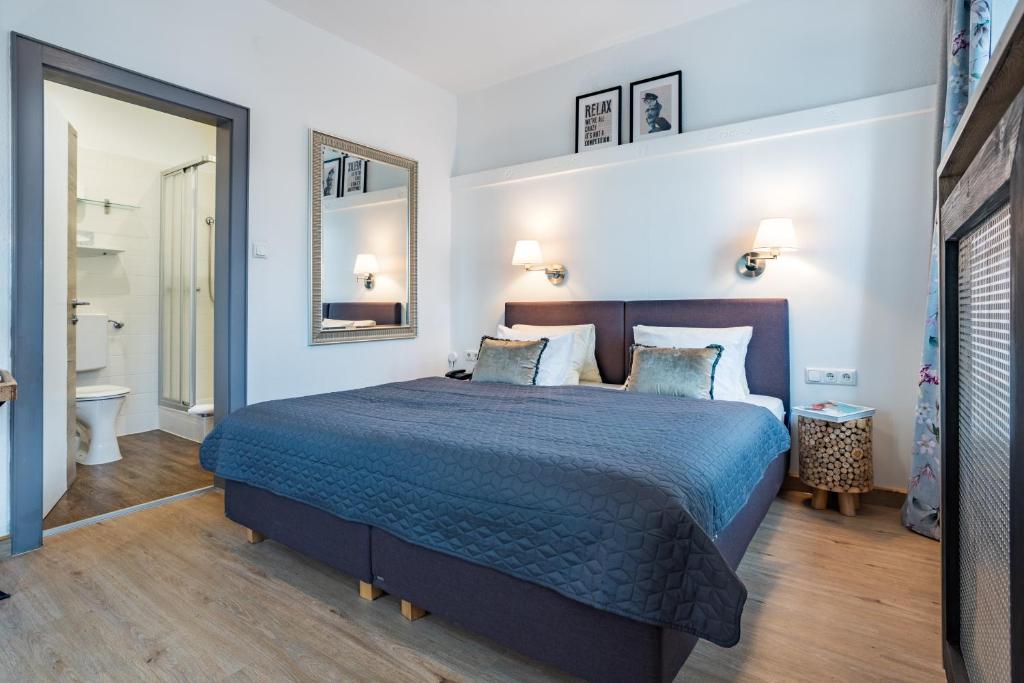 Postel nebo postele na pokoji v ubytování Hotel Seehof