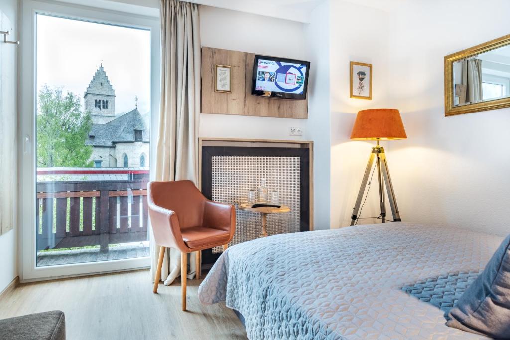 Postel nebo postele na pokoji v ubytování Hotel Seehof