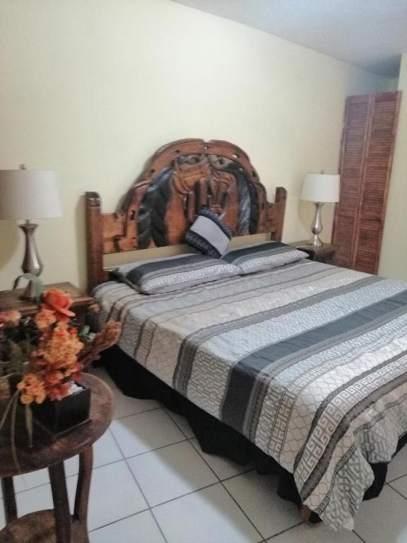 Postel nebo postele na pokoji v ubytování Hotel Chely