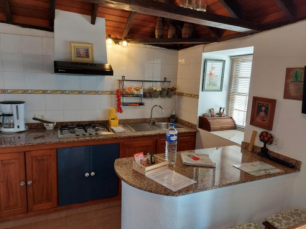 Kuchyň nebo kuchyňský kout v ubytování VV Casa Bastina "by henrypole home"