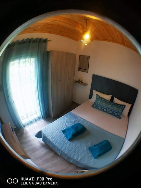 Postel nebo postele na pokoji v ubytování Ktima Mimoza