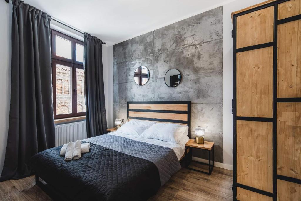 Posteľ alebo postele v izbe v ubytovaní Modern Apartments Toruń 3 Stare Miasto-Centrum