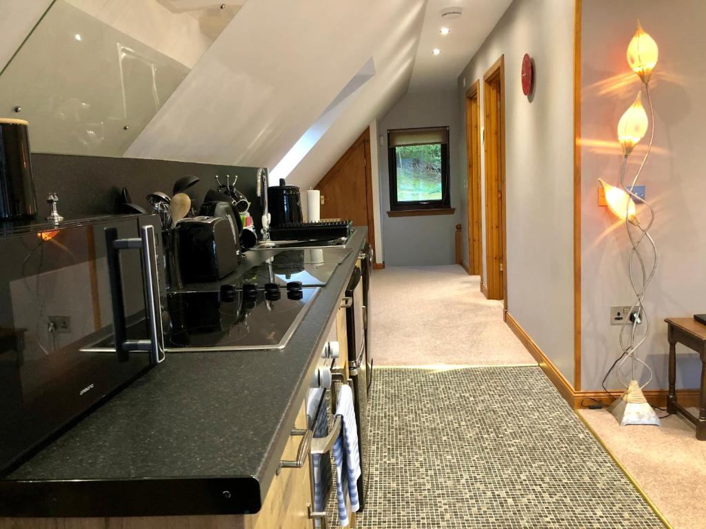 Dapur atau dapur kecil di Hunters Lodge Apartments