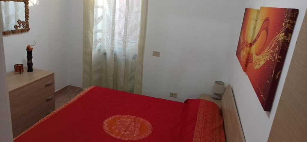 Posteľ alebo postele v izbe v ubytovaní ALLOGGIO TURISTICO IL RIFUGIO IN FIUMICINO