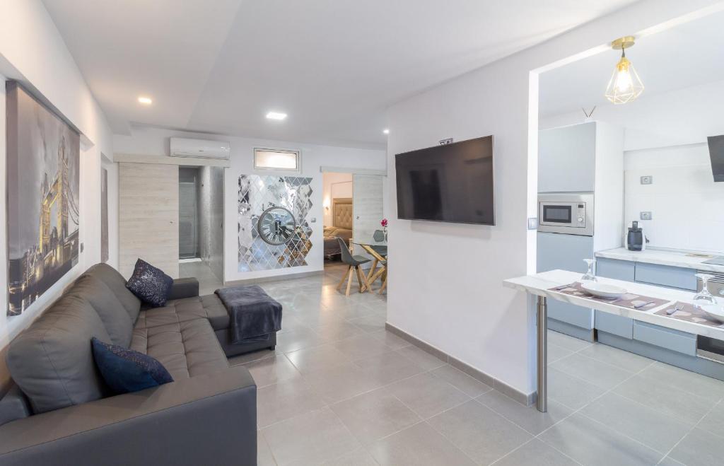 Televízia a/alebo spoločenská miestnosť v ubytovaní Apartamento "Alexia" en San Agustin