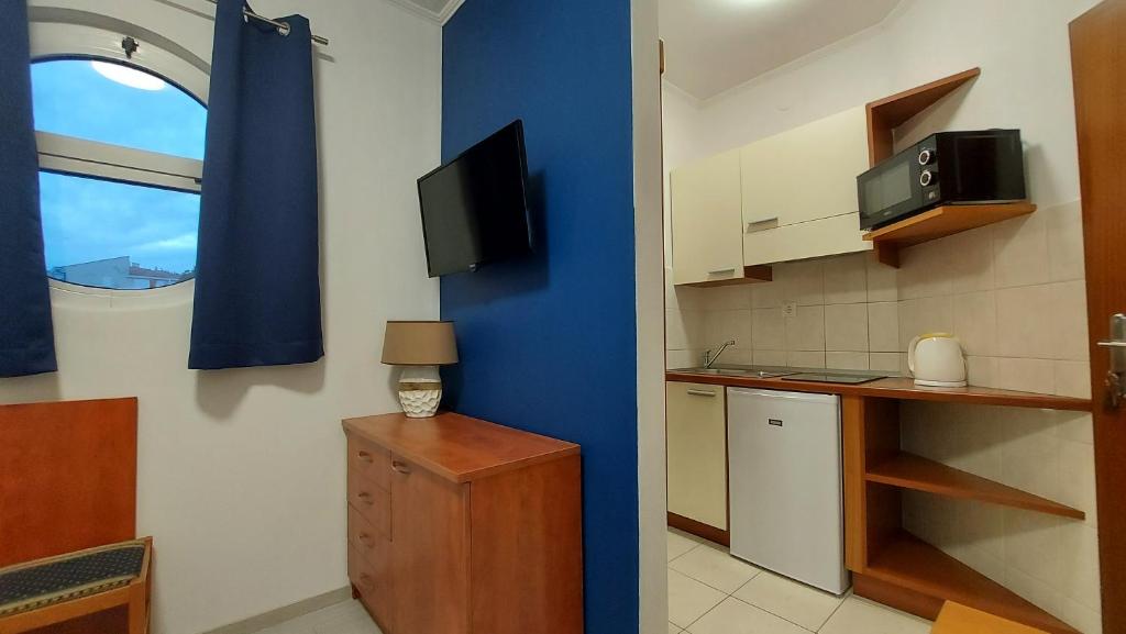 Kuchyň nebo kuchyňský kout v ubytování Villa Rossa
