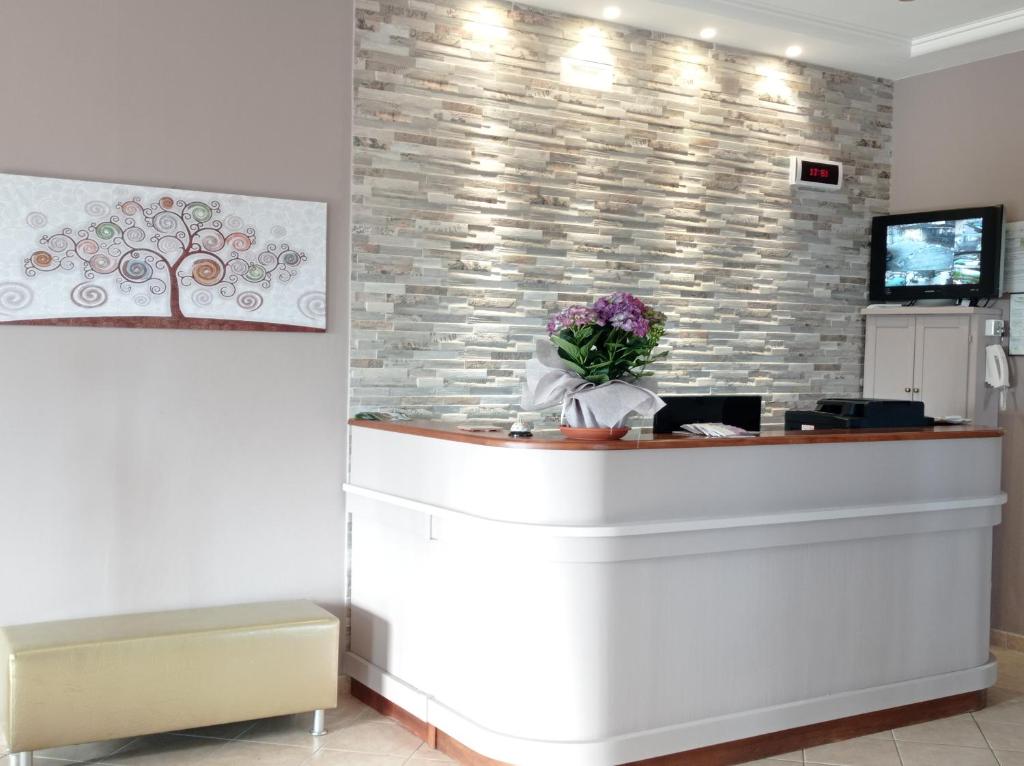 TV a/nebo společenská místnost v ubytování Viole Country Hotel