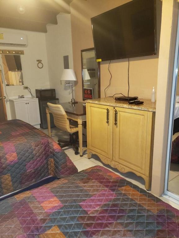 TV a/nebo společenská místnost v ubytování Georges Royal Inn