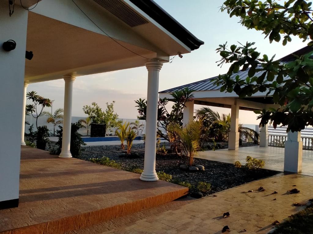 a pavilion with a view of the ocean at Cesar Villa sea side in Tagudin