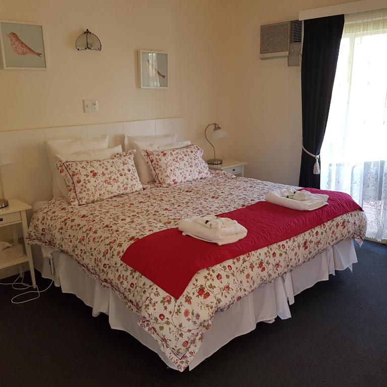 Postel nebo postele na pokoji v ubytování Pecan Hill BNB