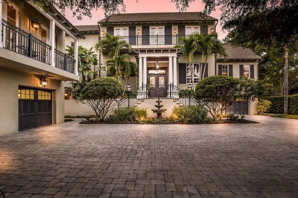 a house with a driveway in front of it at Sarasota Luxury Estate in Sarasota
