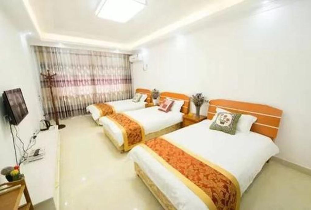 Postel nebo postele na pokoji v ubytování One Meter Sunshine Hotel Xi'an Xianyang International Airport Flagship Store