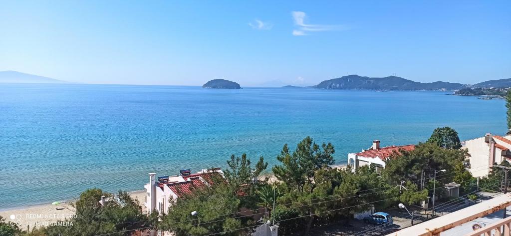 a view of the beach and the ocean at Fotini's studio in Paleo Tsifliki