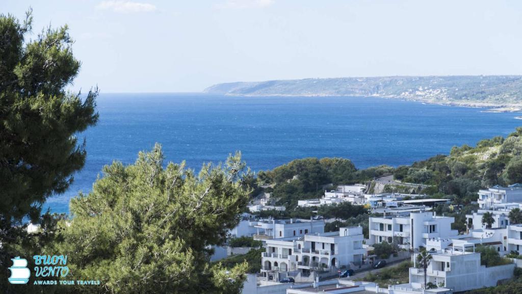 a view of a town with the ocean in the background at La Marea in Castro di Lecce