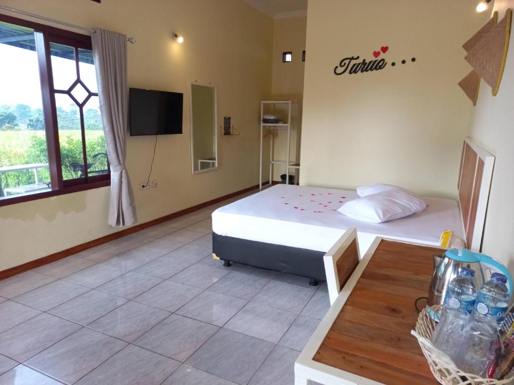 Postel nebo postele na pokoji v ubytování SUWON homestay