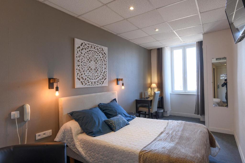Postel nebo postele na pokoji v ubytování Hotel de l'Europe