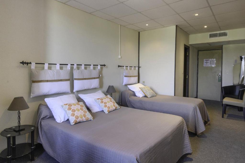 Postel nebo postele na pokoji v ubytování Hotel de l'Europe