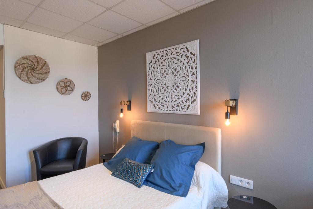 Postel nebo postele na pokoji v ubytování Hotel de l'Europe