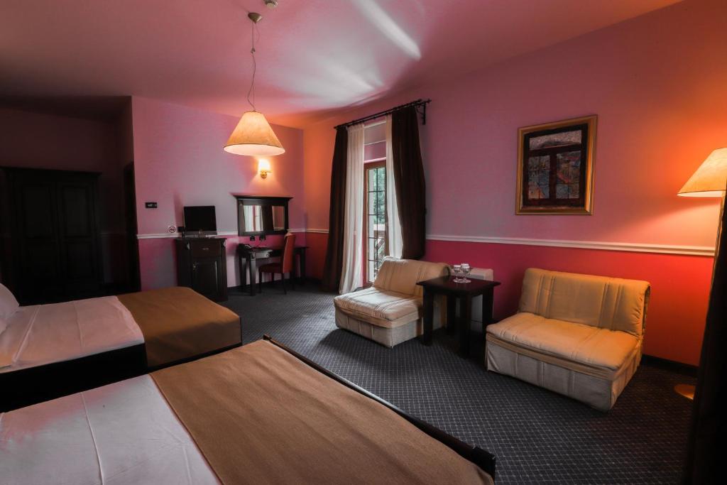 Postel nebo postele na pokoji v ubytování Hotel Bitoraj Fužine