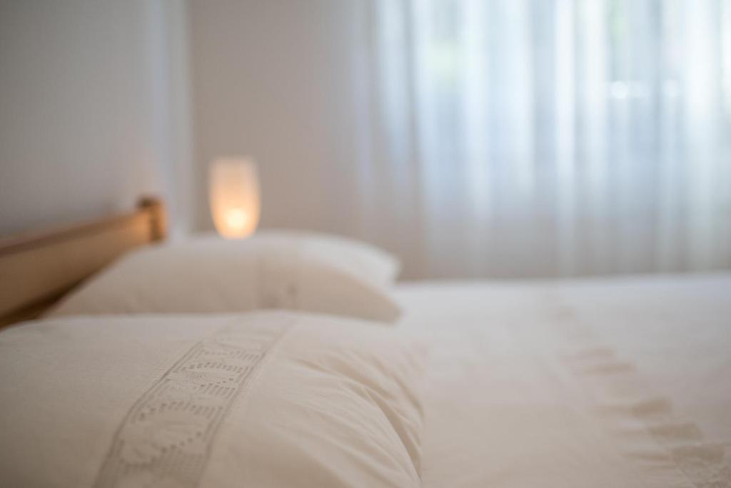 Posteľ alebo postele v izbe v ubytovaní Apartments Ana S