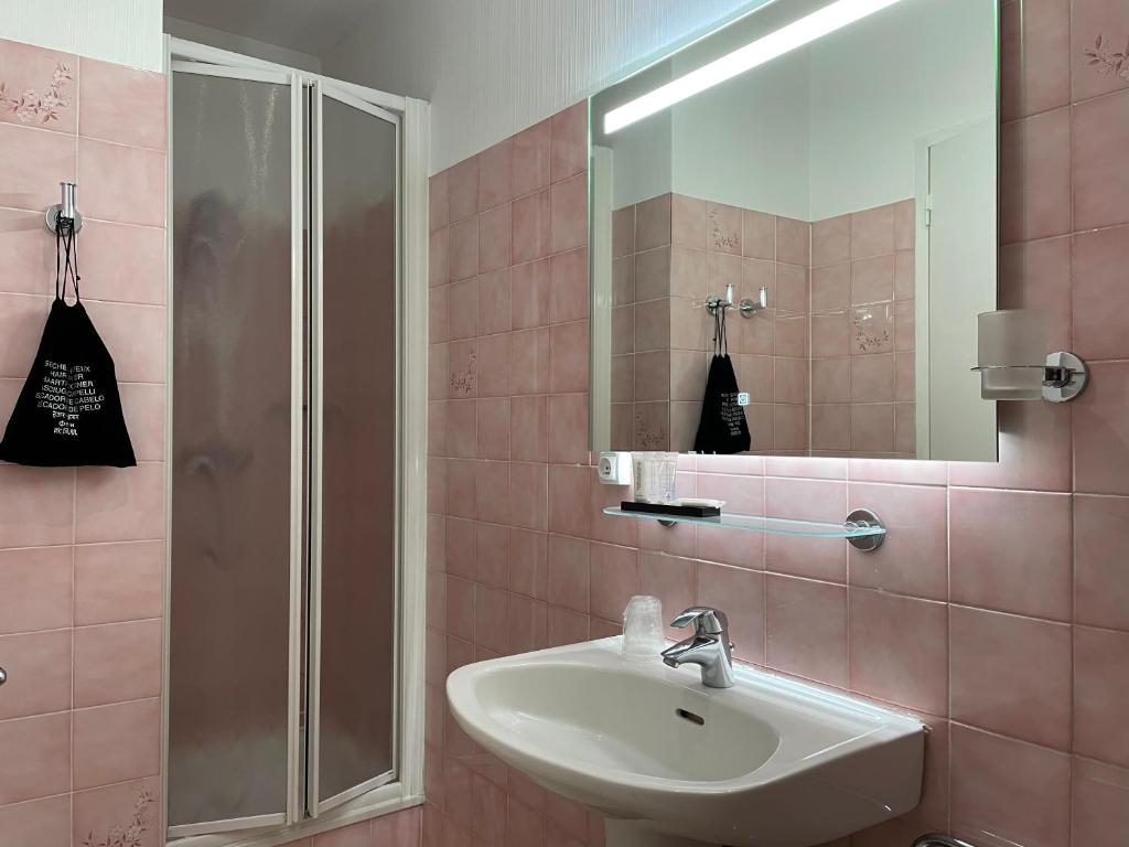 Koupelna v ubytování Hôtel Neptune