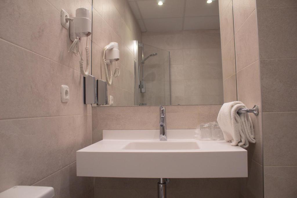 Koupelna v ubytování Hotel Ezeiza