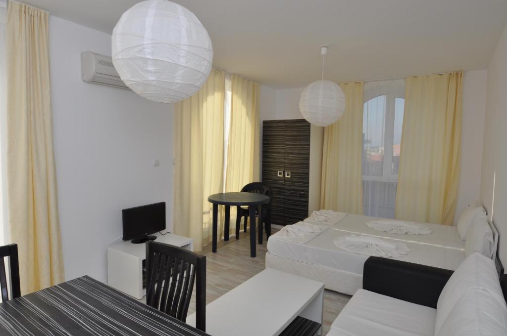 Postel nebo postele na pokoji v ubytování Boutique Suites Rainbow 4