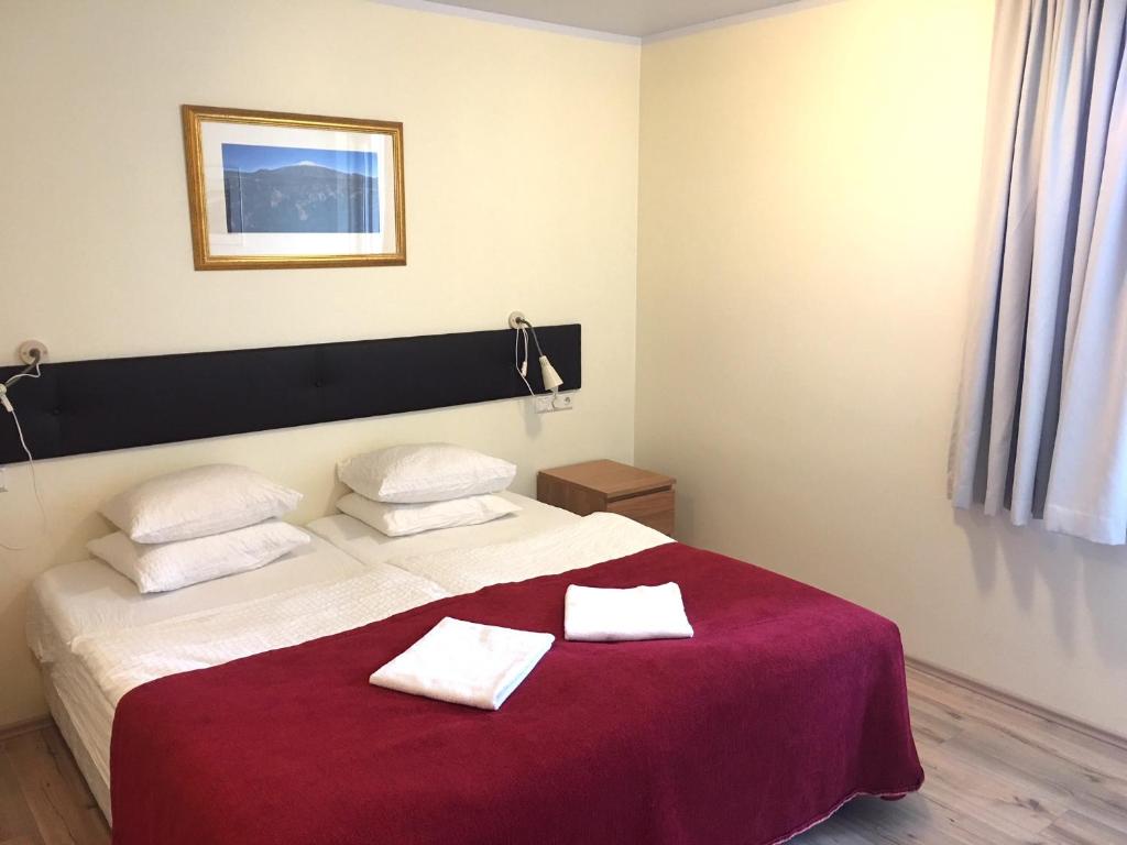Postel nebo postele na pokoji v ubytování Downtown Reykjavík Apartments