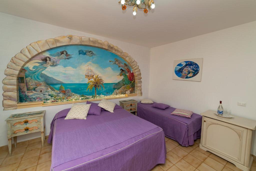 Postel nebo postele na pokoji v ubytování Casa Teresa