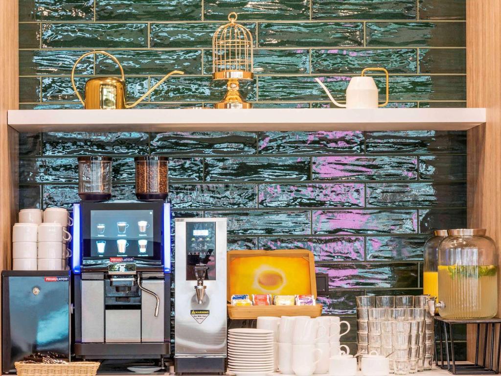 Kuchyň nebo kuchyňský kout v ubytování ibis Styles Kraków East